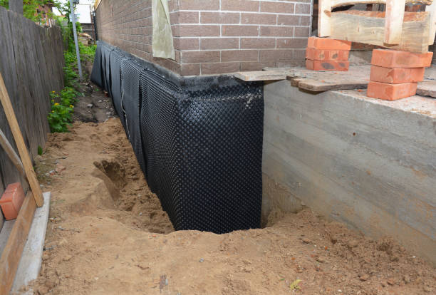 Happy homeowners after waterproofing job in Chesterfield